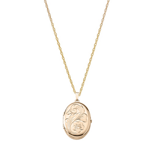 Medaljon m. 14kt. påvalset guld. inkl. kæde